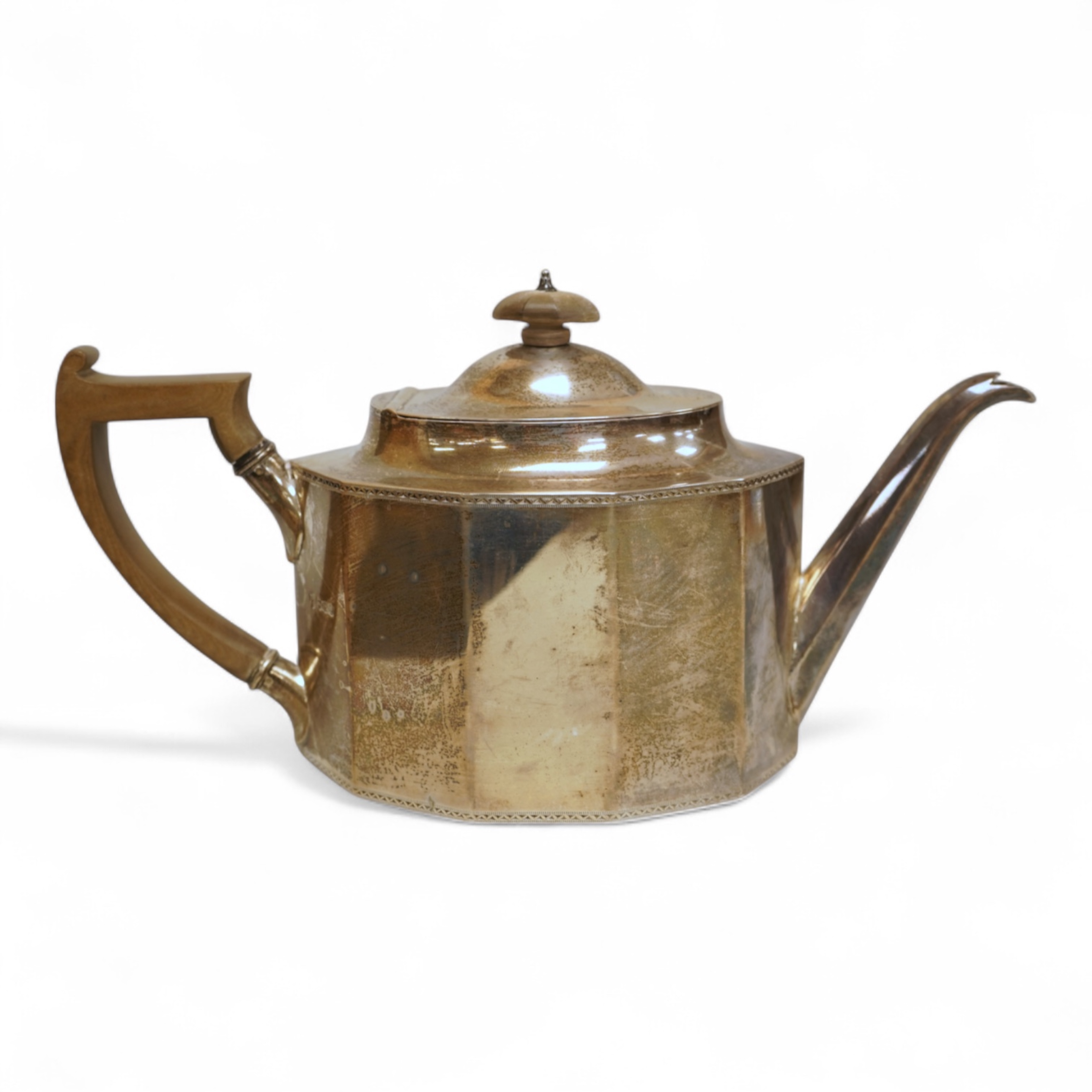 A George V silver decagonal teapot, by Thomas Bradbury & Sons, Sheffield, 1922, gross weight 18.1oz.